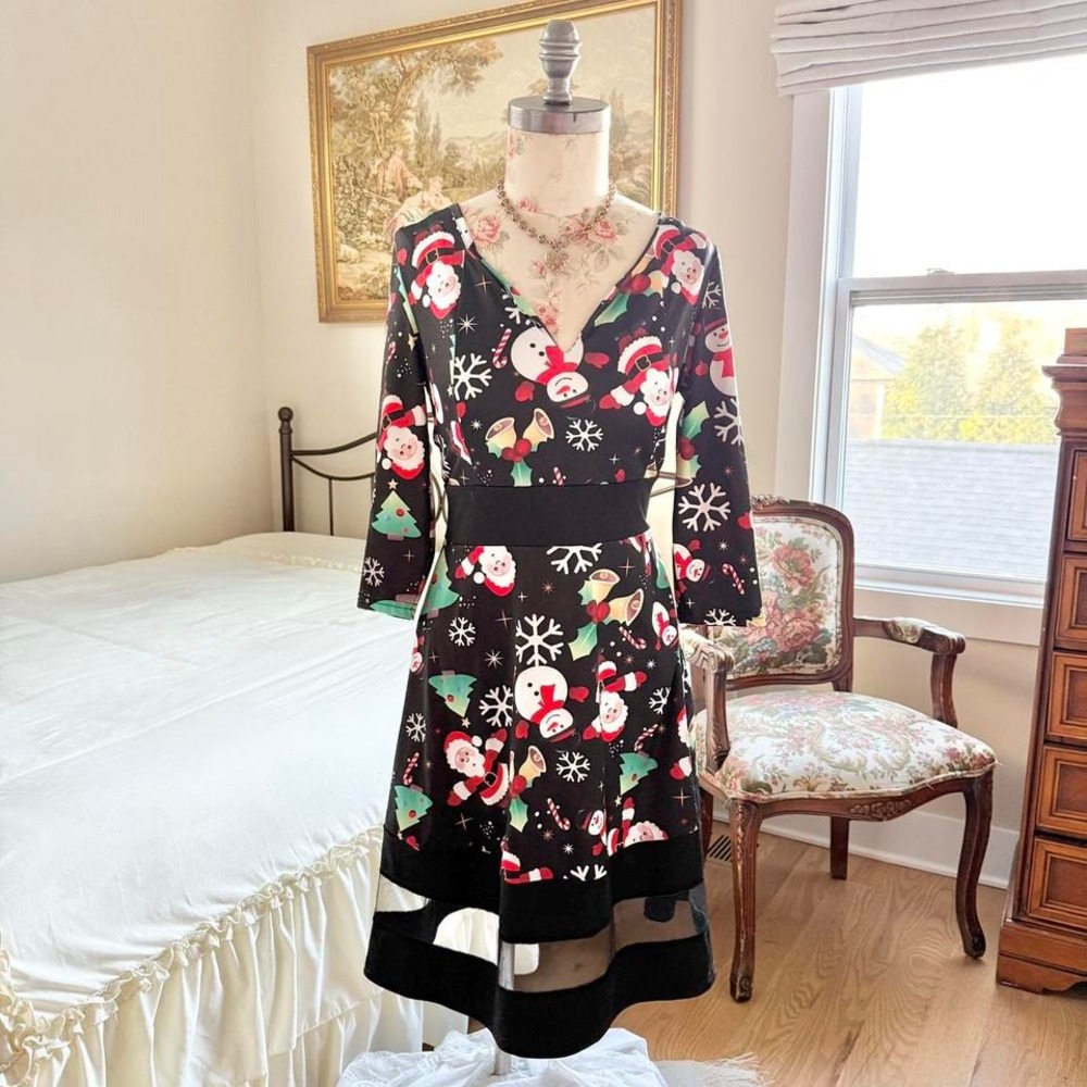 Y2K fits like‎ a medium black christmas dress